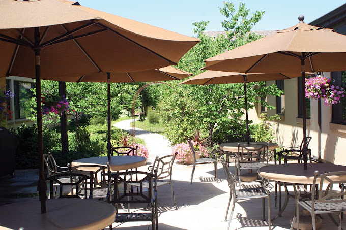 covered outdoor patio seating at Monument Health Stonecreek