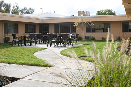 exterior pathways and seating at Monument Health Taylorsville