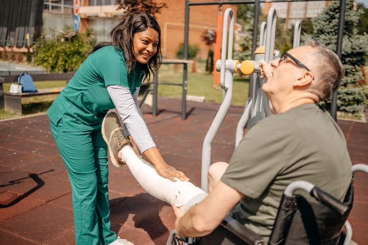 Can Physical Therapy Speed Up Recovery From A Work Injury? 1 A physical therapist working with her patient who's in a wheelchair after an injury.