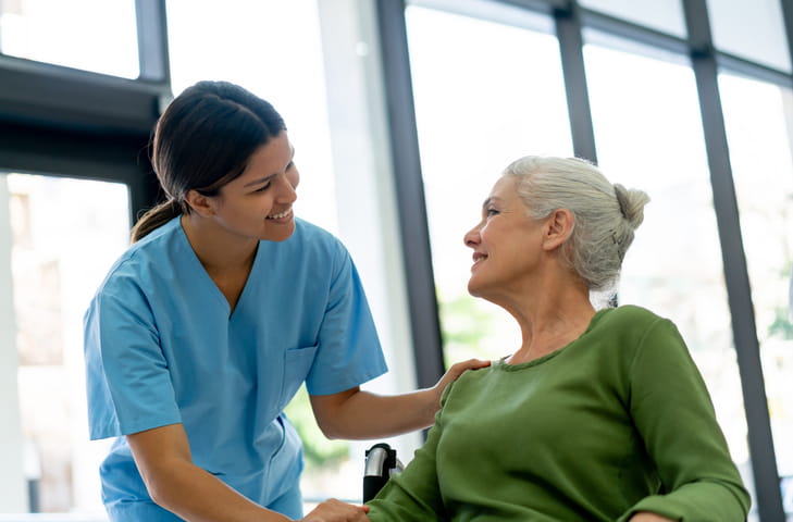How Long Can You Stay In A Skilled Nursing Facility? 1 A nurse assists a patient inside a skilled nursing facility.