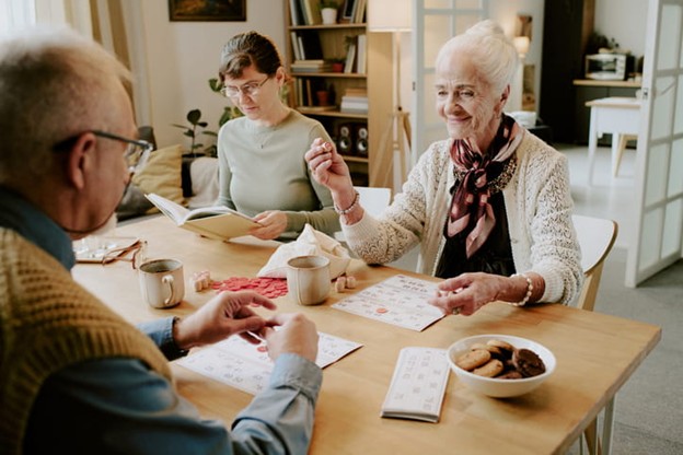 A family works on crafts together.